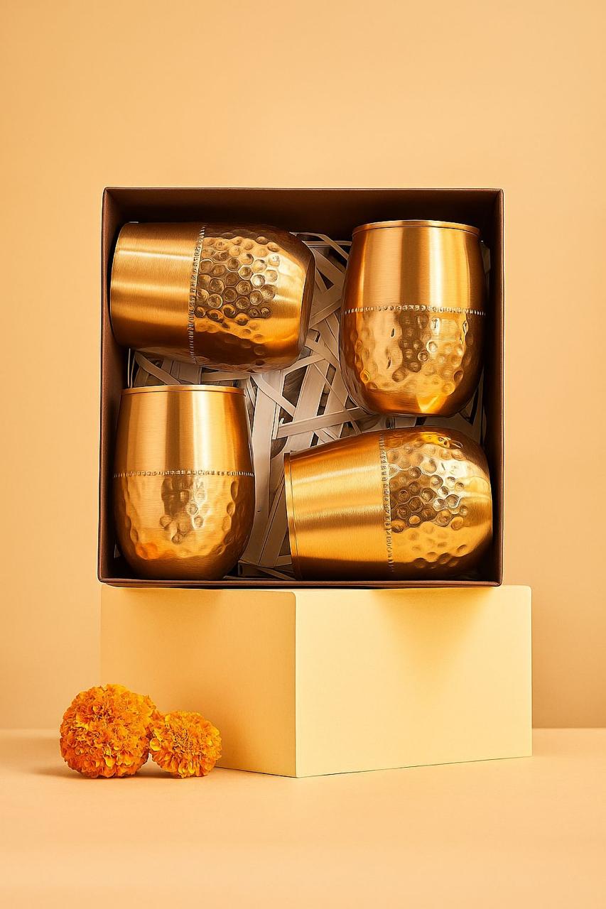 Elegant Ladoo Glass Set (4 Pieces) with Decorative Accent Candle